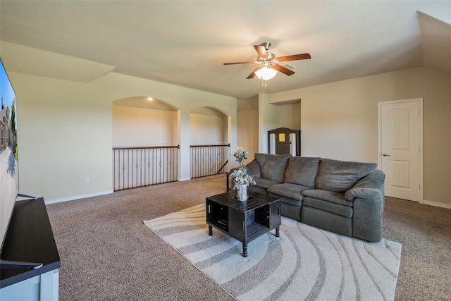 living room with ceiling fan and light colored carpet