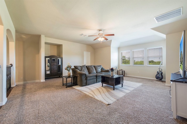 living room featuring light carpet, ceiling fan, and lofted ceiling