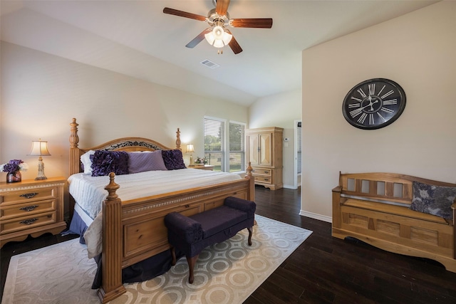 bedroom with dark wood-type flooring, ceiling fan, and vaulted ceiling