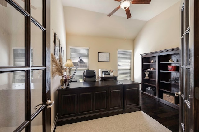 office space with ceiling fan, wood-type flooring, and lofted ceiling