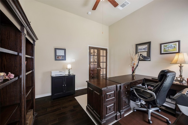 office with ceiling fan, french doors, dark wood-type flooring, and lofted ceiling