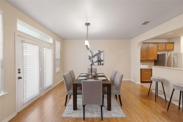 dining area featuring light hardwood / wood-style flooring