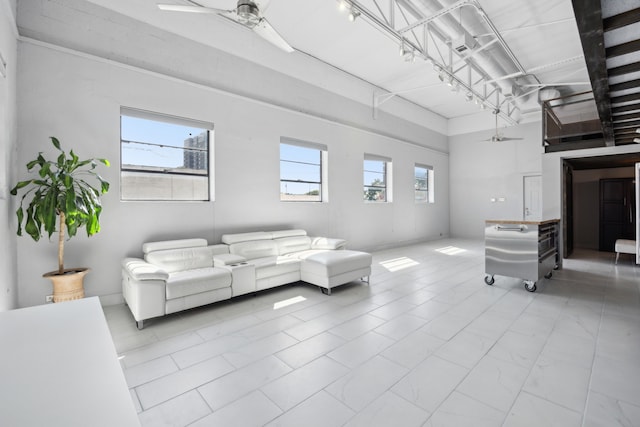 living room with ceiling fan