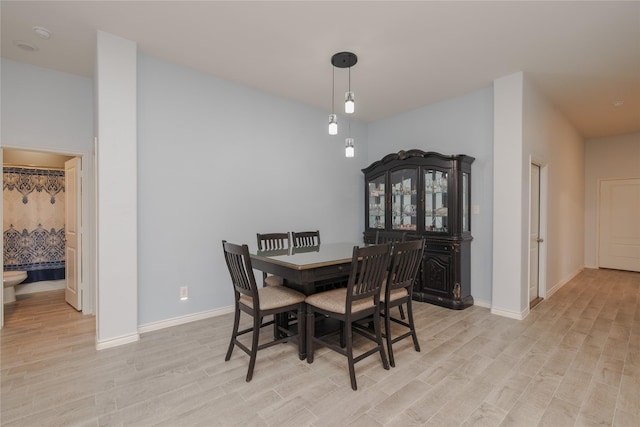 dining room featuring light hardwood / wood-style flooring