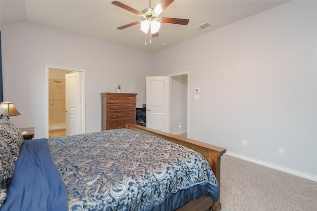 carpeted bedroom with ensuite bath, ceiling fan, and lofted ceiling