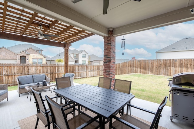 view of patio featuring a pergola, outdoor lounge area, and ceiling fan