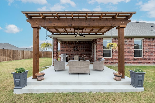 view of patio with ceiling fan, a grill, and a pergola