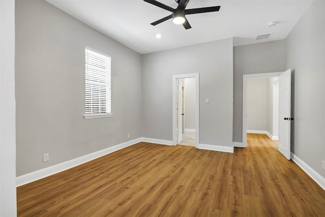 unfurnished bedroom featuring ceiling fan and light hardwood / wood-style flooring