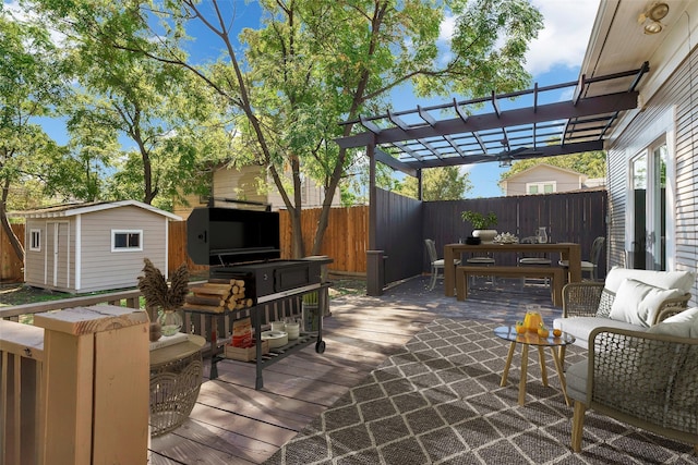 wooden deck featuring a pergola, an outdoor living space, and a storage unit