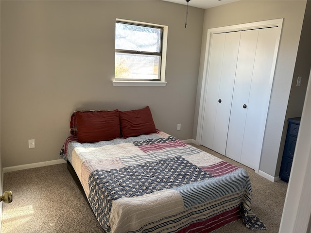 bedroom featuring carpet floors and a closet