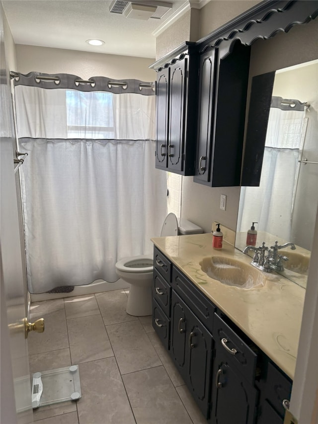 full bathroom with toilet, vanity, tile patterned flooring, and shower / bath combination with curtain