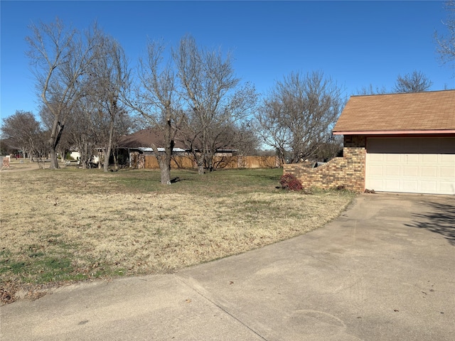 view of yard featuring a garage