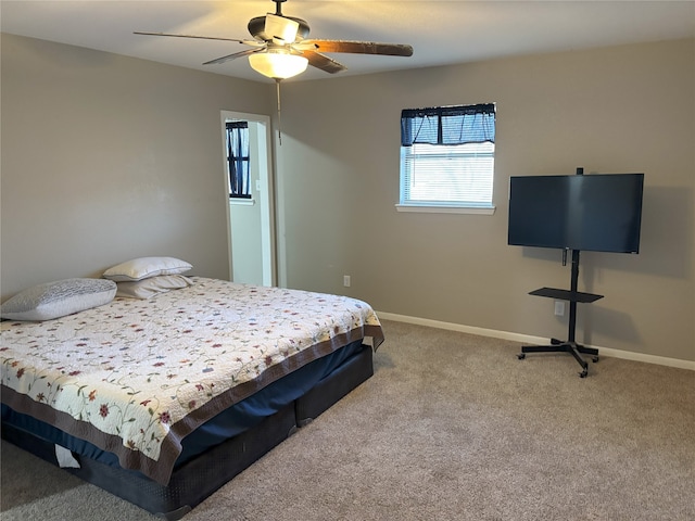 bedroom featuring ceiling fan and carpet floors