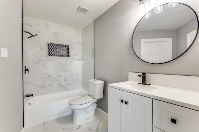 full bathroom with tiled shower / bath combo, vanity, and toilet