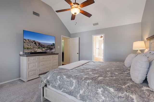 carpeted bedroom with ceiling fan, ensuite bathroom, and lofted ceiling