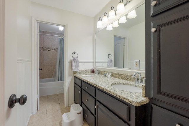 bathroom featuring vanity, shower / tub combo with curtain, and tile patterned floors