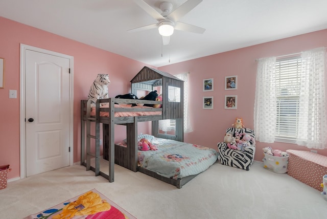 carpeted bedroom featuring ceiling fan