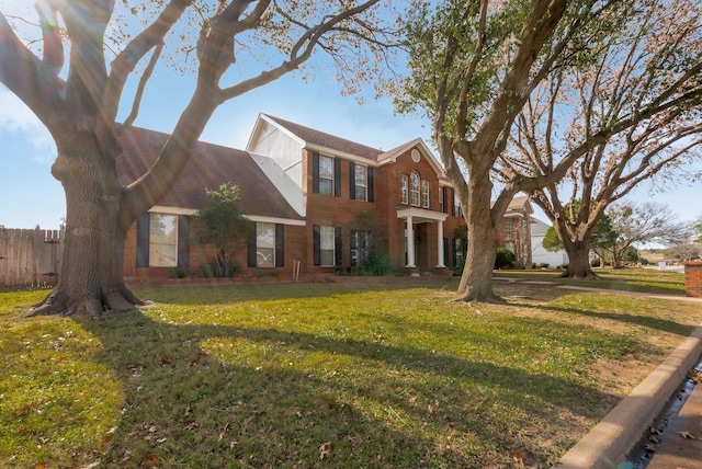 view of front facade with a front yard