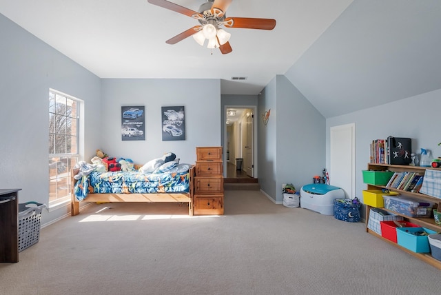 carpeted bedroom featuring ceiling fan and lofted ceiling