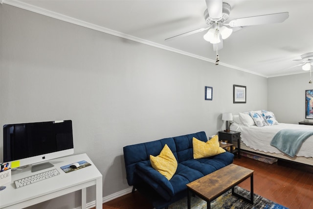 bedroom featuring ceiling fan, dark hardwood / wood-style flooring, and crown molding