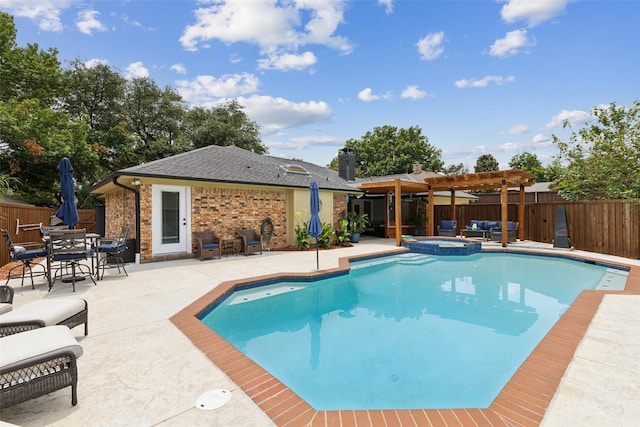 view of swimming pool with a pergola, a patio area, and an in ground hot tub