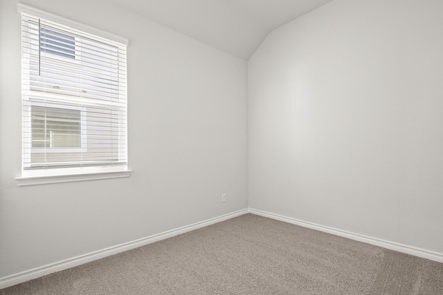 5041 Wellborn Rd, Fort Worth, TX 76036 - carpeted empty room with vaulted ceiling and baseboards