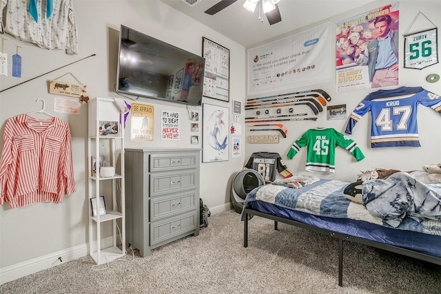 bedroom with ceiling fan and light colored carpet