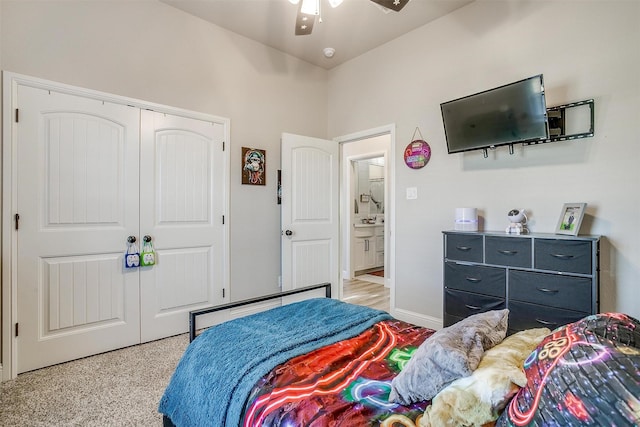 bedroom featuring ceiling fan and a closet