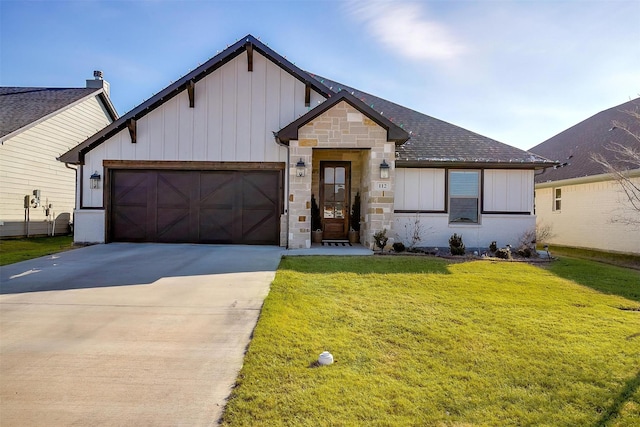 modern farmhouse style home with a front lawn and a garage