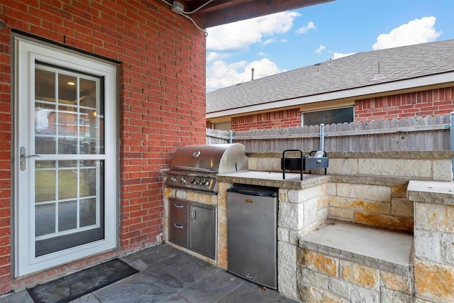 view of patio / terrace featuring a grill and area for grilling