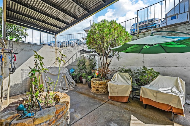 view of patio featuring a pergola