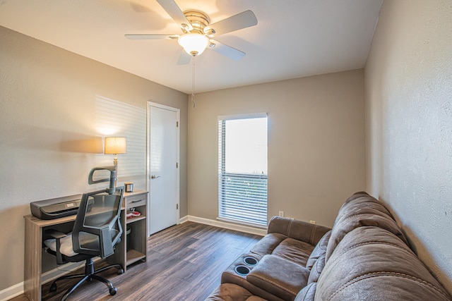 office area featuring ceiling fan and dark wood-type flooring