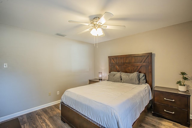 bedroom featuring dark wood-type flooring and ceiling fan