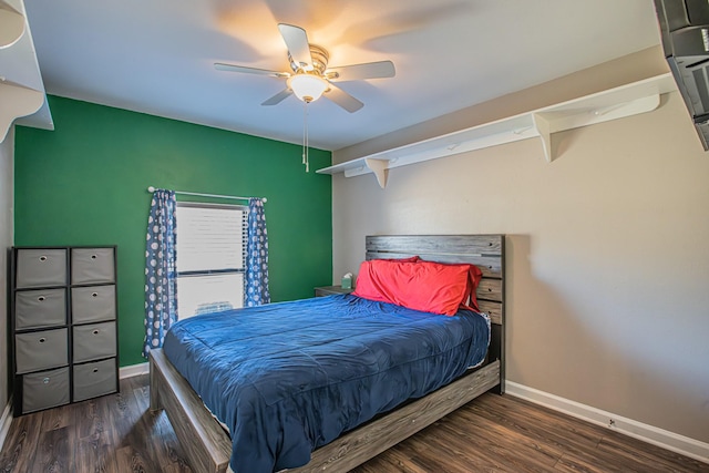 bedroom featuring ceiling fan and dark hardwood / wood-style flooring