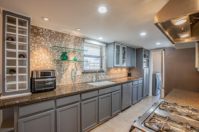 kitchen featuring gray cabinetry, island range hood, dishwasher, and sink