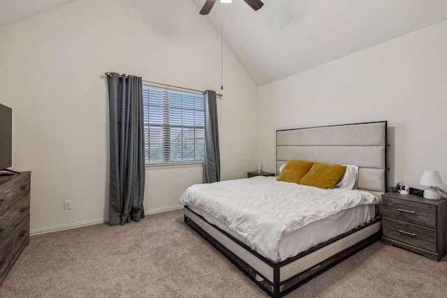 carpeted bedroom featuring ceiling fan and high vaulted ceiling