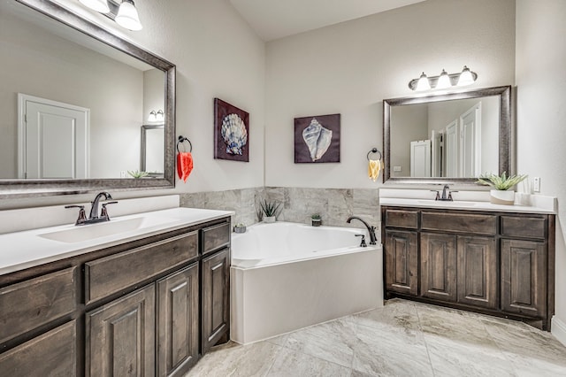 bathroom with a tub to relax in and vanity