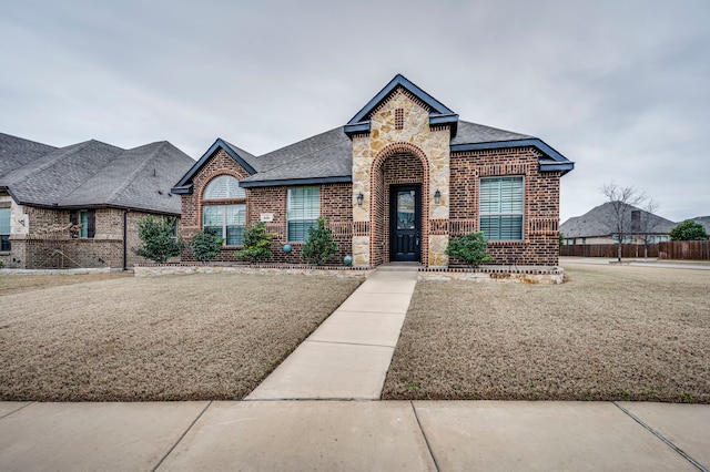 view of front of property with a front lawn