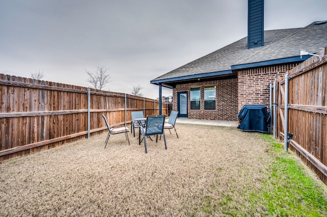 view of yard with a patio area