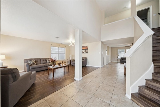 interior space featuring plenty of natural light and a high ceiling