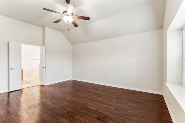 additional living space with ceiling fan, lofted ceiling, and wood-type flooring