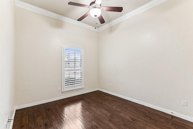 empty room with ceiling fan, crown molding, and hardwood / wood-style floors