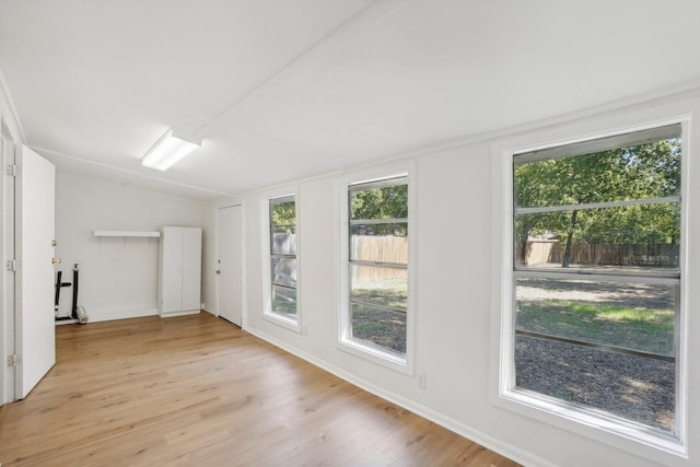 spare room with light hardwood / wood-style floors