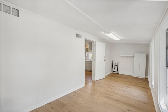 empty room with light wood-type flooring