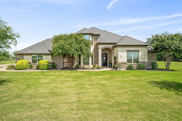 view of front of house with a front lawn