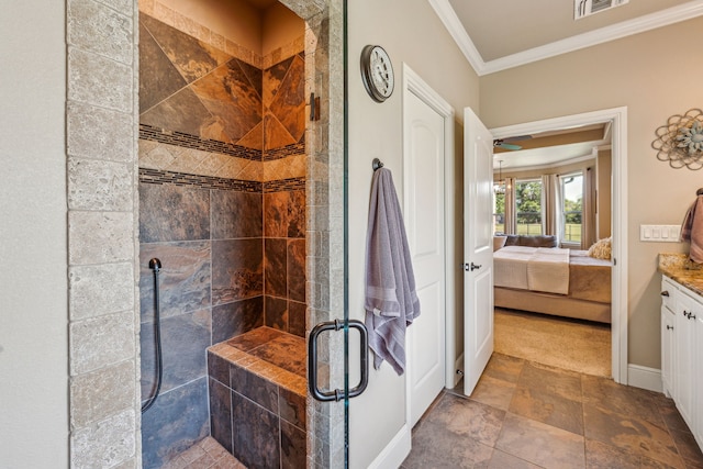 bathroom featuring walk in shower, crown molding, and vanity