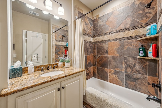 bathroom with vanity and shower / bathtub combination with curtain