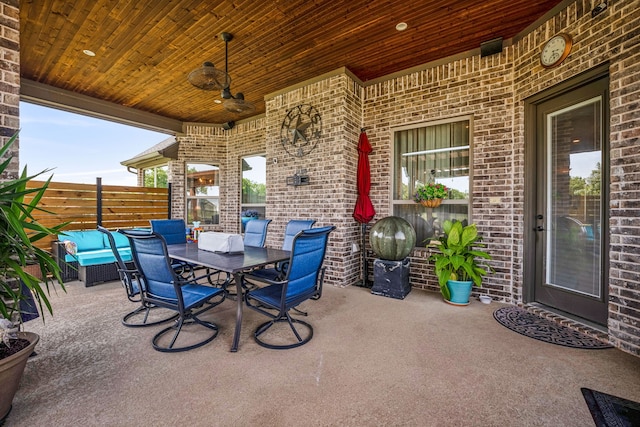 view of patio / terrace featuring ceiling fan