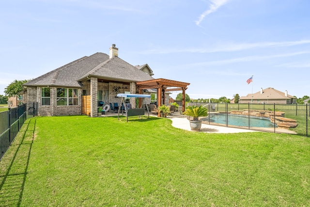 rear view of house with a fenced in pool, a yard, a patio, and a pergola