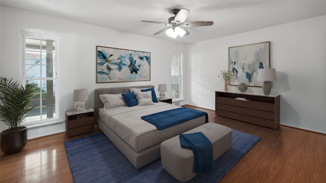 bedroom featuring dark hardwood / wood-style floors and ceiling fan